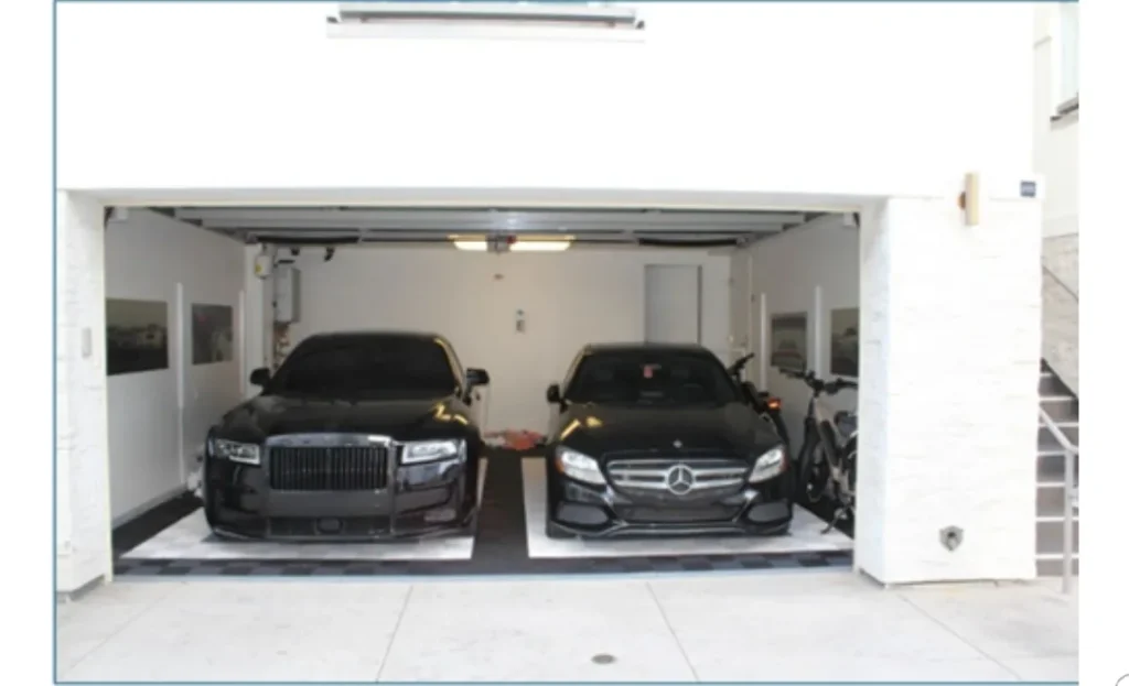 The cars he bought with the proceed from the crypto fraud.
Source: Justice.gov
